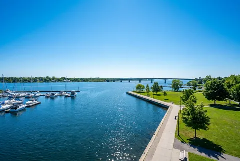 The sunny sparkling Bay of Quinte at Belleville with boats.