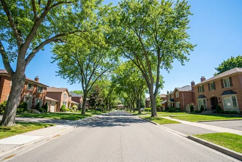 A leafy sunny residential street in Scarborough, Toronto.